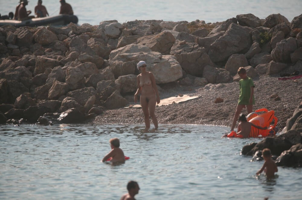 FKK cove pyramid in waters - Human nature in its original form