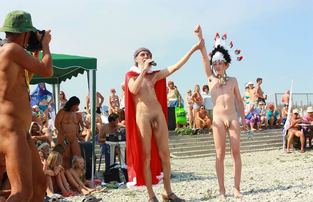 Native Headdress Dance pics - A Base for Naturist Recreation