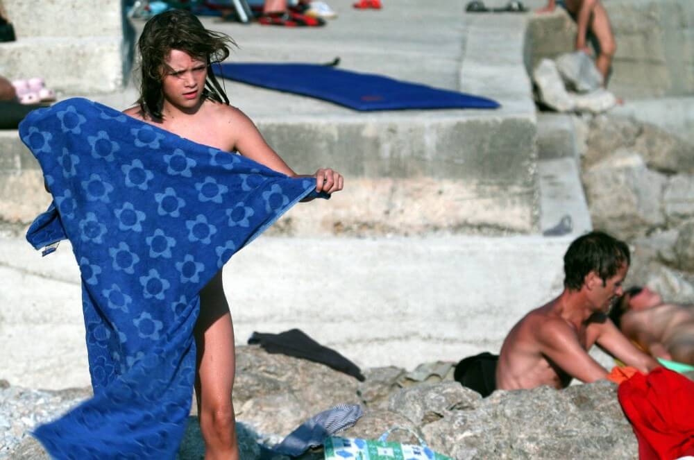 Nudist Rocky Family Angle - Harmony and balance are important in this nudist culture