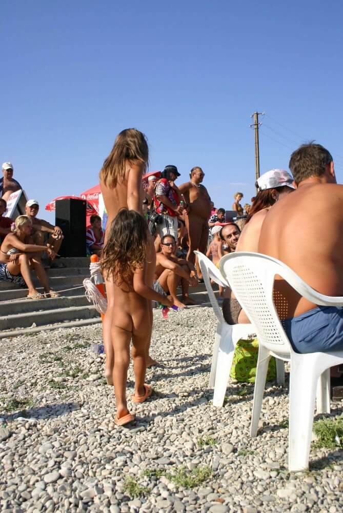 Naturist Standing Sideline - The practice of nudity within a community