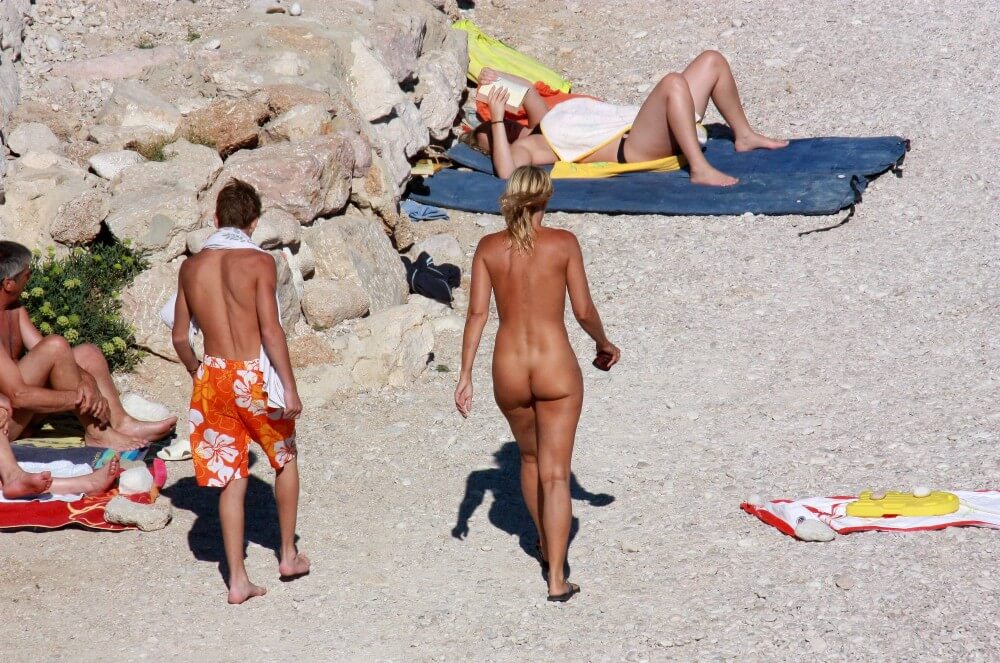 European Beach Entrance pics - Seeks harmony with the rhythms of nature and the environment through nudity