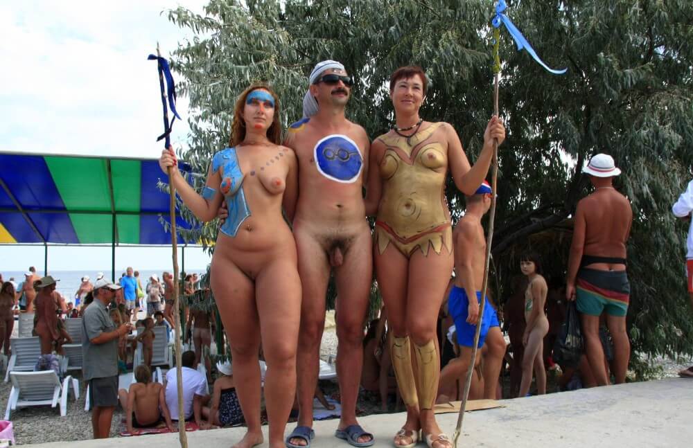 Three Painted Girl Poses pics - A slight inclination toward nudism