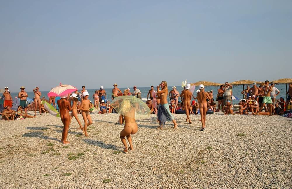 Ribbon and Umbrella Dance pics - The practice of nudism fosters trust and honesty