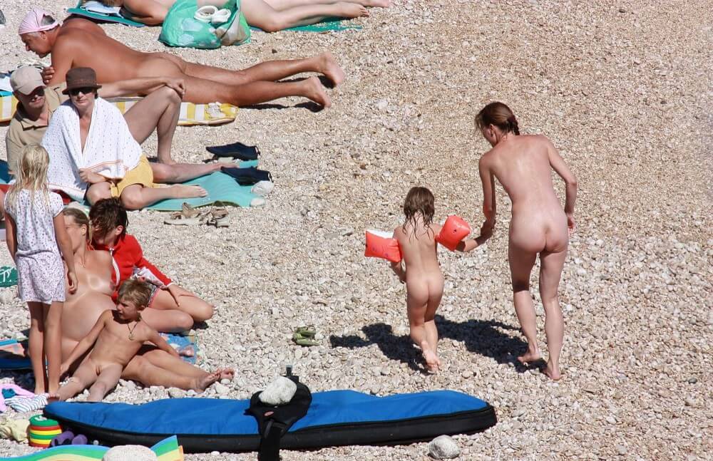 Orange Floaty Safety First Naturist pics - The desire to connect with nature and be unclothed