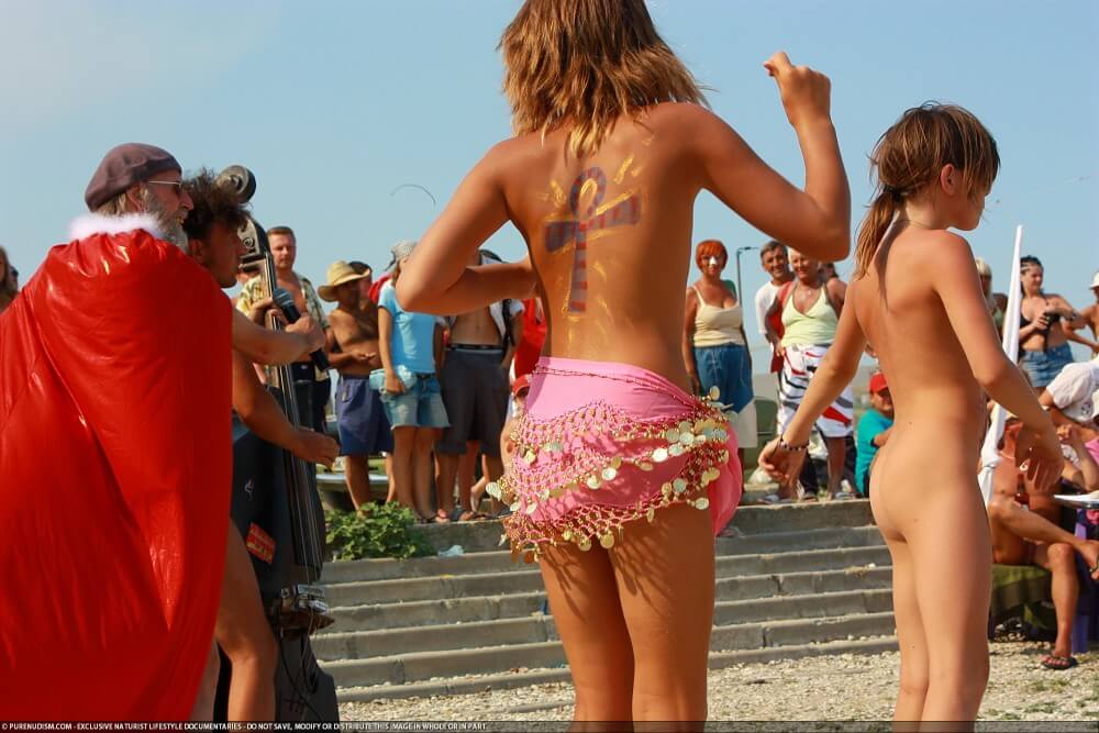 Colorful Carnival Dancing photos - Nudism is often equated with naturism